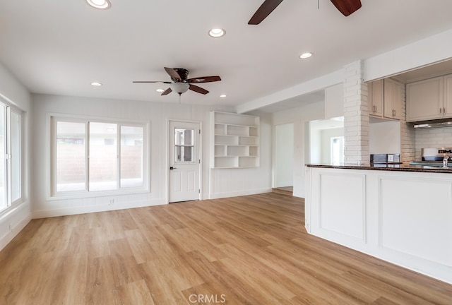 117 E 229th Pl, Carson, CA 90745 - unfurnished living room with a ceiling fan, light wood-type flooring, recessed lighting, baseboards, and built in features