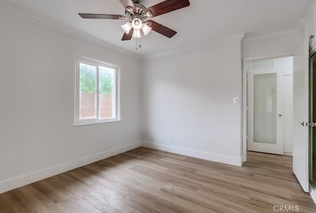 117 E 229th Pl, Carson, CA 90745 - empty room featuring crown molding, baseboards, light wood finished floors, and a ceiling fan