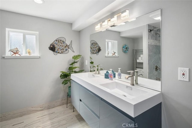 3580 Maricopa Rd, Atascadero, CA 93422 - full bathroom with double vanity, a shower, and wood finished floors