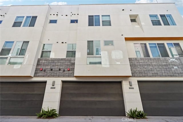 639 Channel Way, Costa Mesa, CA 92627 - view of property featuring a garage