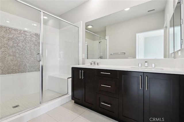 639 Channel Way, Costa Mesa, CA 92627 - full bath featuring tile patterned floors, double vanity, a shower stall, and recessed lighting