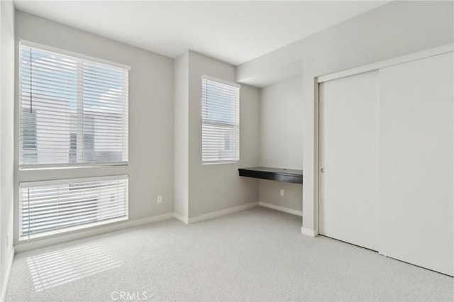 639 Channel Way, Costa Mesa, CA 92627 - unfurnished bedroom with carpet floors and a closet