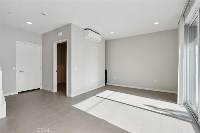 639 Channel Way, Costa Mesa, CA 92627 - unfurnished room with a wall mounted AC, recessed lighting, tile patterned flooring, and a smoke detector