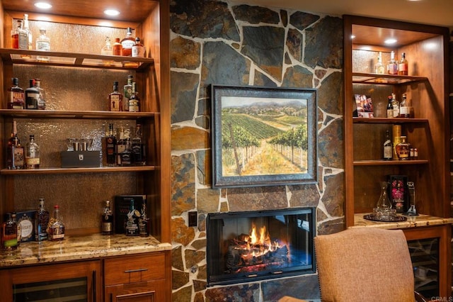 6937 Corte Langosta, Carlsbad, CA 92009 - indoor dry bar with a stone fireplace, wine cooler, and built in features