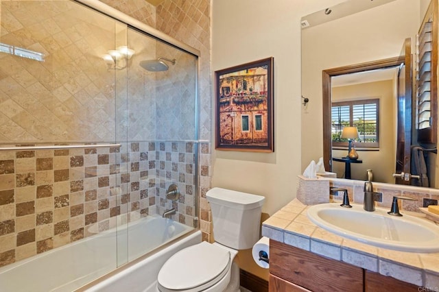 6937 Corte Langosta, Carlsbad, CA 92009 - full bathroom featuring toilet, bath / shower combo with glass door, and vanity