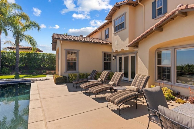 6937 Corte Langosta, Carlsbad, CA 92009 - view of patio featuring french doors