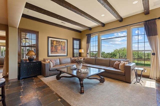 6937 Corte Langosta, Carlsbad, CA 92009 - living room featuring plenty of natural light, beam ceiling, baseboards, and stone tile floors