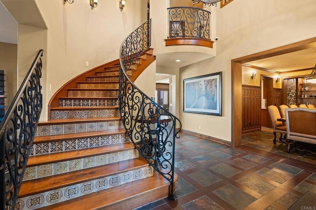 6937 Corte Langosta, Carlsbad, CA 92009 - stairs featuring baseboards and a towering ceiling