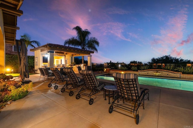 6937 Corte Langosta, Carlsbad, CA 92009 - view of patio / terrace with an outdoor pool and an outbuilding