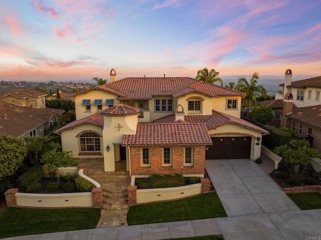 6937 Corte Langosta, Carlsbad, CA 92009 - mediterranean / spanish-style home featuring concrete driveway, a tile roof, stucco siding, brick siding, and a chimney