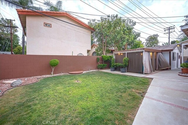 5062 Magnolia Ave, Riverside, CA 92506 - view of yard featuring an outbuilding and a patio area