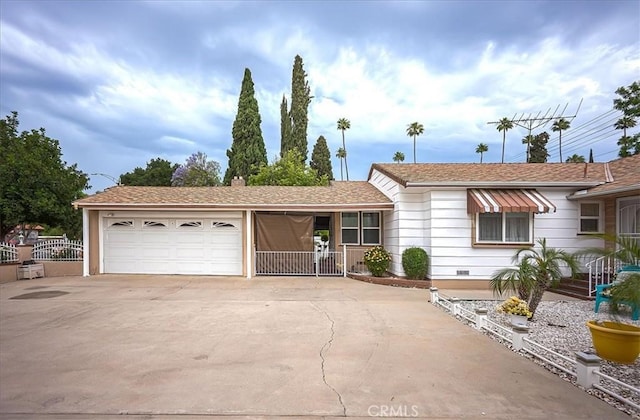 5062 Magnolia Ave, Riverside, CA 92506 - ranch-style house with concrete driveway and a garage