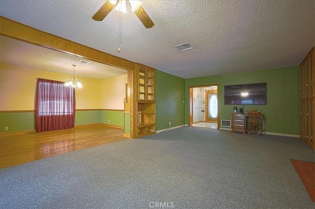 5062 Magnolia Ave, Riverside, CA 92506 - unfurnished living room with a ceiling fan, carpet, a chandelier, baseboards, and a textured ceiling