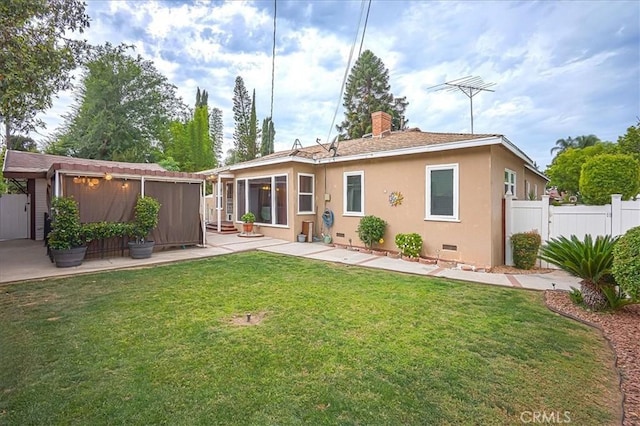 5062 Magnolia Ave, Riverside, CA 92506 - rear view of house featuring stucco siding, a patio area, and a chimney