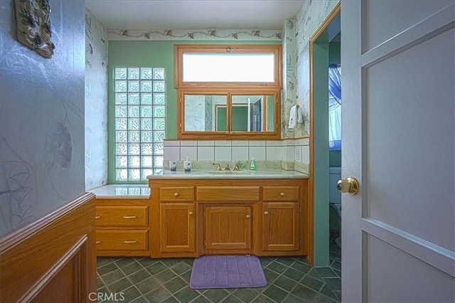 5062 Magnolia Ave, Riverside, CA 92506 - bathroom featuring vanity, tile patterned floors, and a tub to relax in