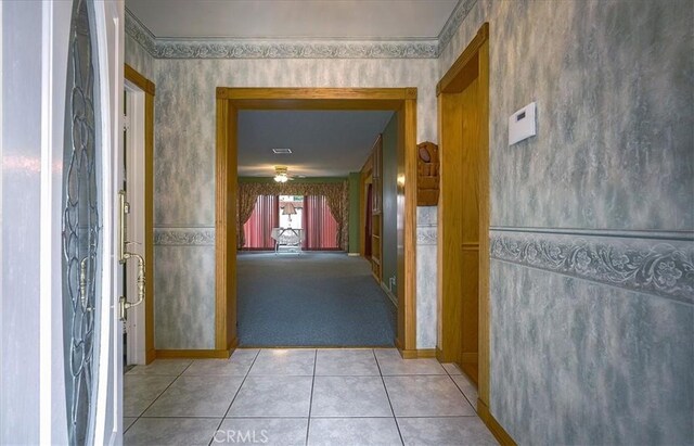 5062 Magnolia Ave, Riverside, CA 92506 - hall with light tile patterned floors, light carpet, and baseboards