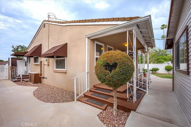 5062 Magnolia Ave, Riverside, CA 92506 - view of home's exterior featuring stucco siding and a patio