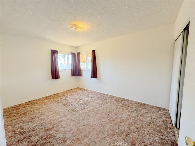 2574 W Glencrest Ave, Anaheim, CA 92801 - carpeted spare room with a textured ceiling