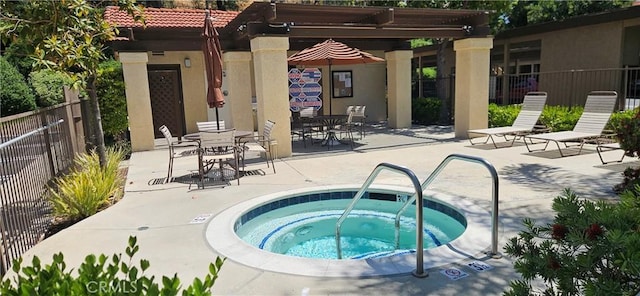 21208 Camelia Unit 44, Lake Forest, CA 92630 - view of pool with a community hot tub, a patio, a pergola, and a swimming pool