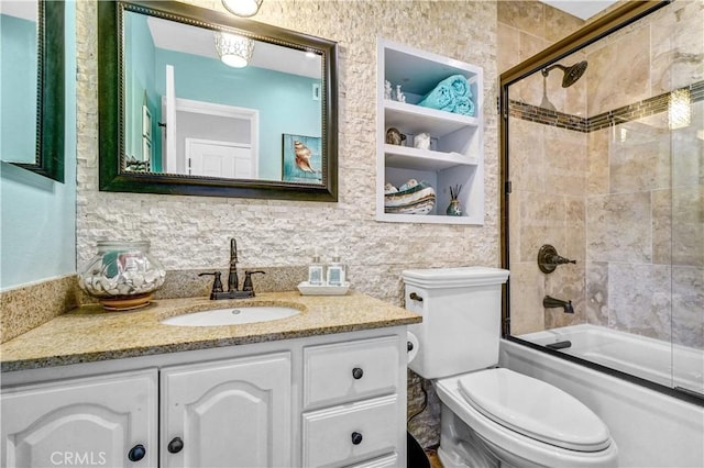 631 Holmes Ave, Placentia, CA 92870 - full bath with toilet, vanity, shower / bath combination with glass door, tile walls, and tasteful backsplash