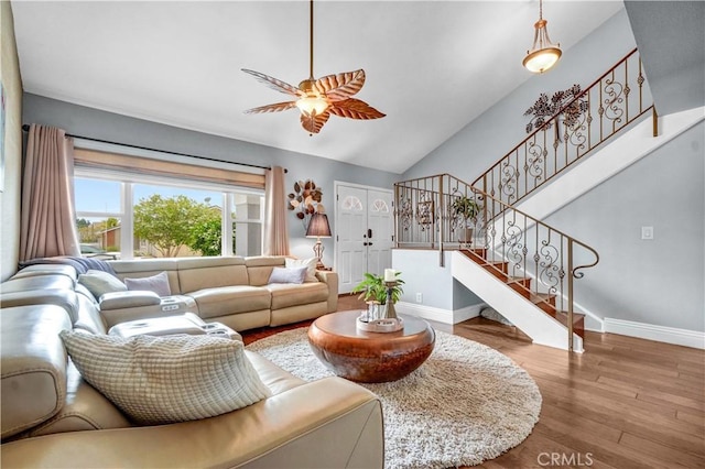 631 Holmes Ave, Placentia, CA 92870 - living area featuring stairs, wood finished floors, baseboards, vaulted ceiling, and a ceiling fan