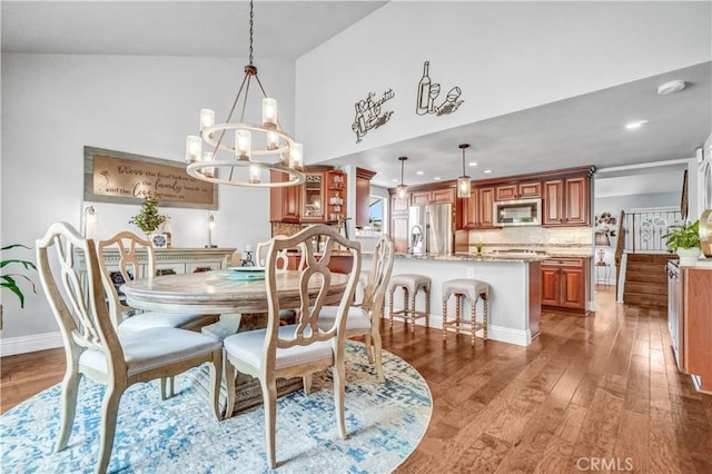 631 Holmes Ave, Placentia, CA 92870 - dining room featuring light wood-style flooring, a chandelier, recessed lighting, and baseboards