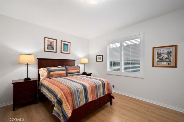 4583 Tuscani Dr, Cypress, CA 90630 - bedroom featuring wood finished floors and baseboards