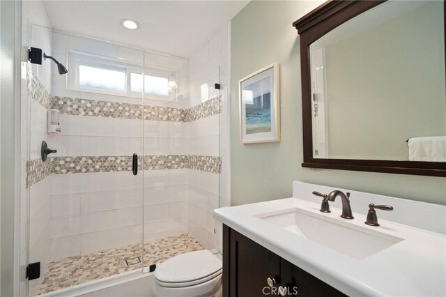 4583 Tuscani Dr, Cypress, CA 90630 - full bathroom with vanity, a shower stall, toilet, and recessed lighting
