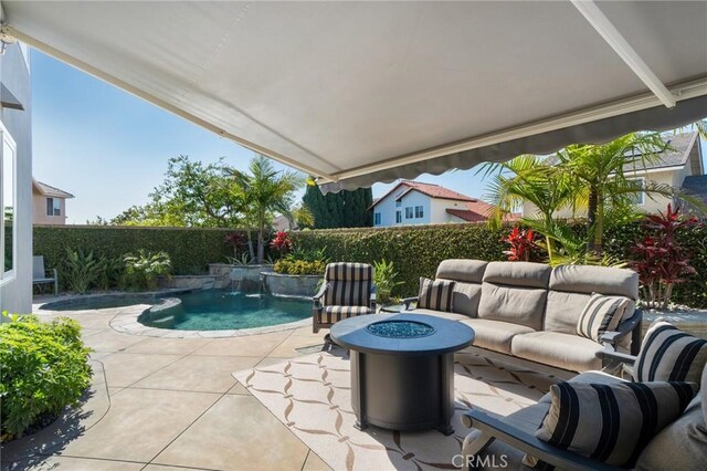 4583 Tuscani Dr, Cypress, CA 90630 - fenced backyard with a patio area, a pool with connected hot tub, and an outdoor living space with a fire pit