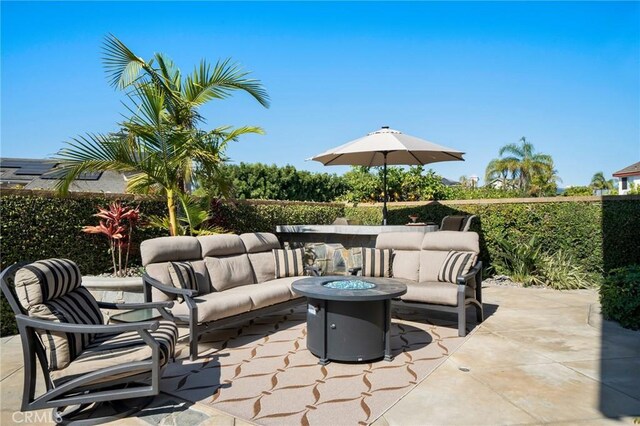 4583 Tuscani Dr, Cypress, CA 90630 - fenced backyard with an outdoor living space with a fire pit and a patio area