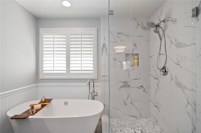 4583 Tuscani Dr, Cypress, CA 90630 - full bath with a wainscoted wall, a marble finish shower, and a soaking tub