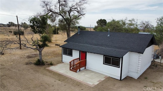 11213 Monte Vista Rd, Phelan, CA 92371 - view of front of home featuring a shingled roof and a patio