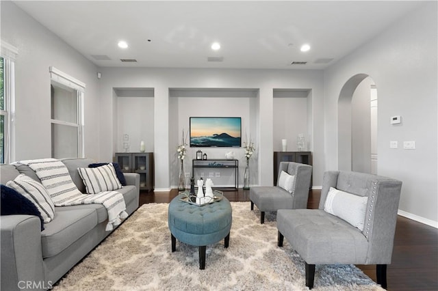 1138 Las Colinas Way, San Dimas, CA 91773 - living area with arched walkways, wood finished floors, baseboards, and recessed lighting