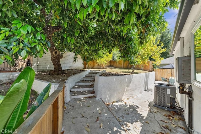 4312 Division St, Los Angeles, CA 90065 - fenced backyard featuring cooling unit and a patio