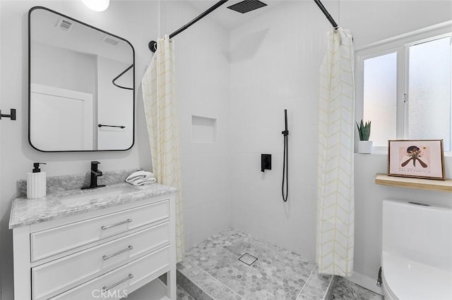 4312 Division St, Los Angeles, CA 90065 - bathroom with vanity, a tile shower, and toilet