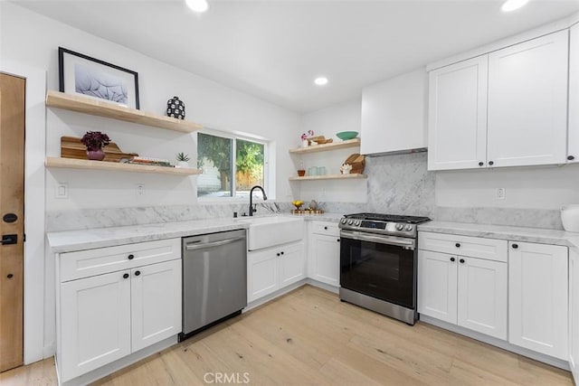 4312 Division St, Los Angeles, CA 90065 - kitchen with appliances with stainless steel finishes, open shelves, a sink, light wood-type flooring, and recessed lighting