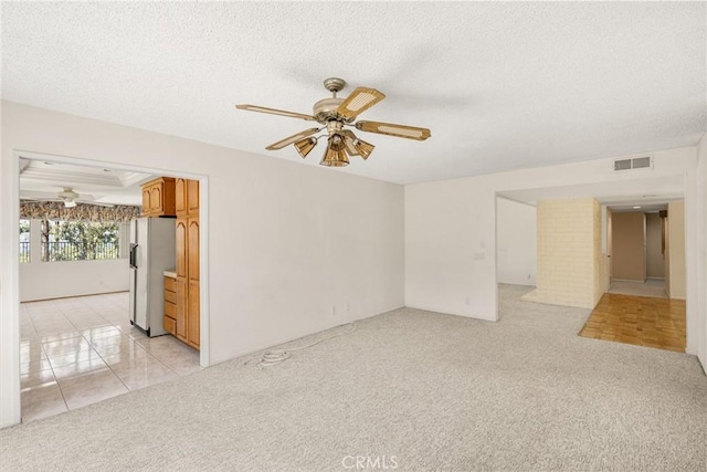 6459 E Via Arboles, Anaheim Hills, CA 92807 - unfurnished living room with ceiling fan, light colored carpet, and a textured ceiling