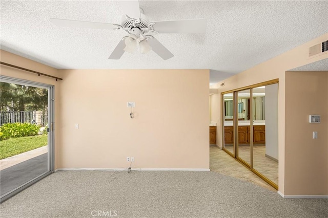 6459 E Via Arboles, Anaheim Hills, CA 92807 - carpeted empty room featuring a textured ceiling, ceiling fan, and baseboards