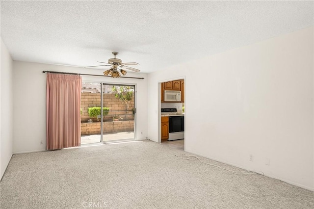 6459 E Via Arboles, Anaheim Hills, CA 92807 - spare room featuring light carpet, a ceiling fan, and a textured ceiling