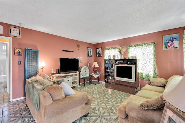 470 E Home St, Long Beach, CA 90805 - living area featuring a textured ceiling, a heating unit, baseboards, and tile patterned floors
