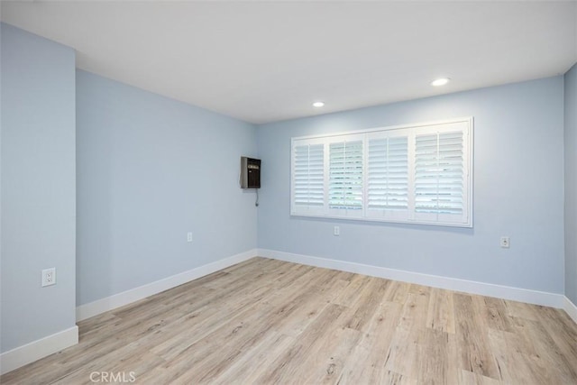 4014 Calle Sonora Oeste Unit 1G, Laguna Woods, CA 92637 - spare room with light wood-style flooring, baseboards, and recessed lighting
