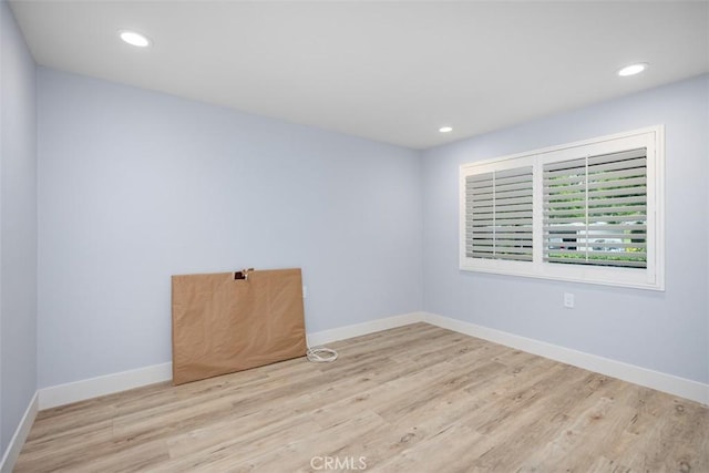4014 Calle Sonora Oeste Unit 1G, Laguna Woods, CA 92637 - spare room featuring wood finished floors, recessed lighting, and baseboards