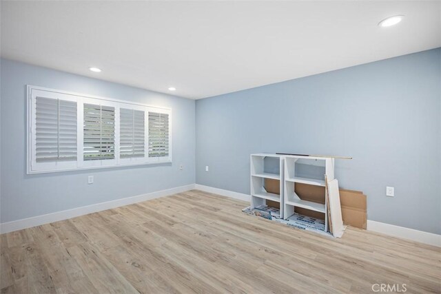 4014 Calle Sonora Oeste Unit 1G, Laguna Woods, CA 92637 - empty room with wood finished floors, recessed lighting, and baseboards