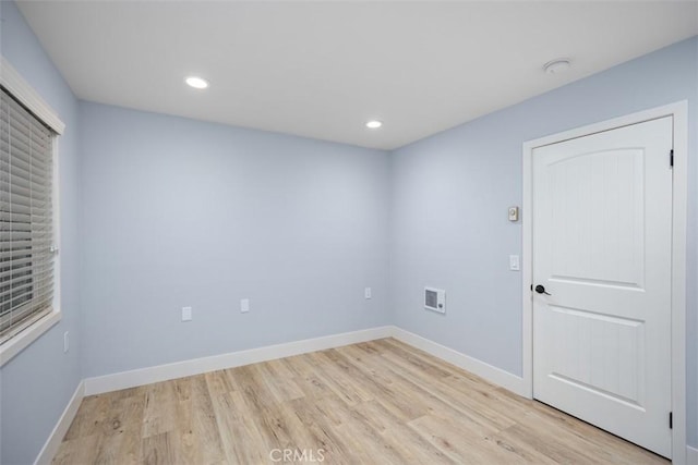4014 Calle Sonora Oeste Unit 1G, Laguna Woods, CA 92637 - unfurnished room featuring light wood finished floors, baseboards, recessed lighting, and a smoke detector