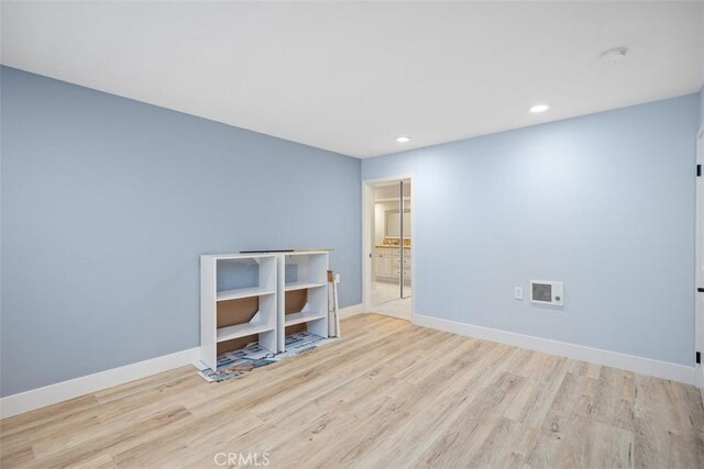 4014 Calle Sonora Oeste Unit 1G, Laguna Woods, CA 92637 - spare room with wood finished floors, baseboards, and recessed lighting