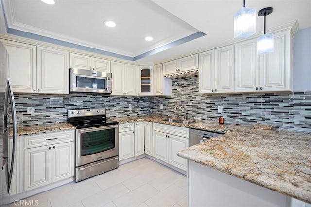4014 Calle Sonora Oeste Unit 1G, Laguna Woods, CA 92637 - kitchen with stainless steel appliances, a sink, a tray ceiling, light stone counters, and tasteful backsplash