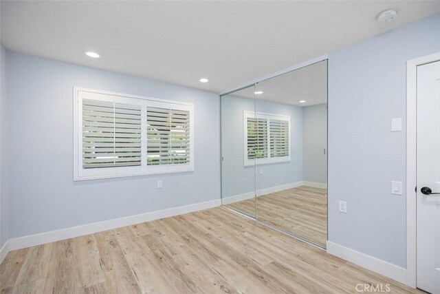 4014 Calle Sonora Oeste Unit 1G, Laguna Woods, CA 92637 - unfurnished room featuring a smoke detector, wood finished floors, baseboards, and recessed lighting