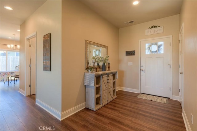 2381 Clearview Dr, Paradise, CA 95969 - entrance foyer featuring dark wood finished floors, recessed lighting, baseboards, and a chandelier