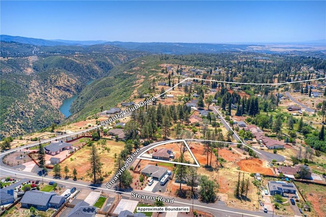 2381 Clearview Dr, Paradise, CA 95969 - aerial view of residential area featuring property parcel outlined and a mountain backdrop