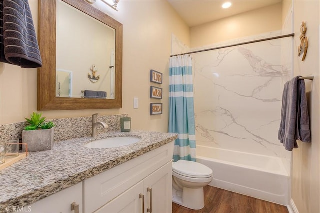 2381 Clearview Dr, Paradise, CA 95969 - bathroom with vanity, wood finished floors, shower / bath combo, and toilet